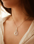 Pipa knot pendant, silver